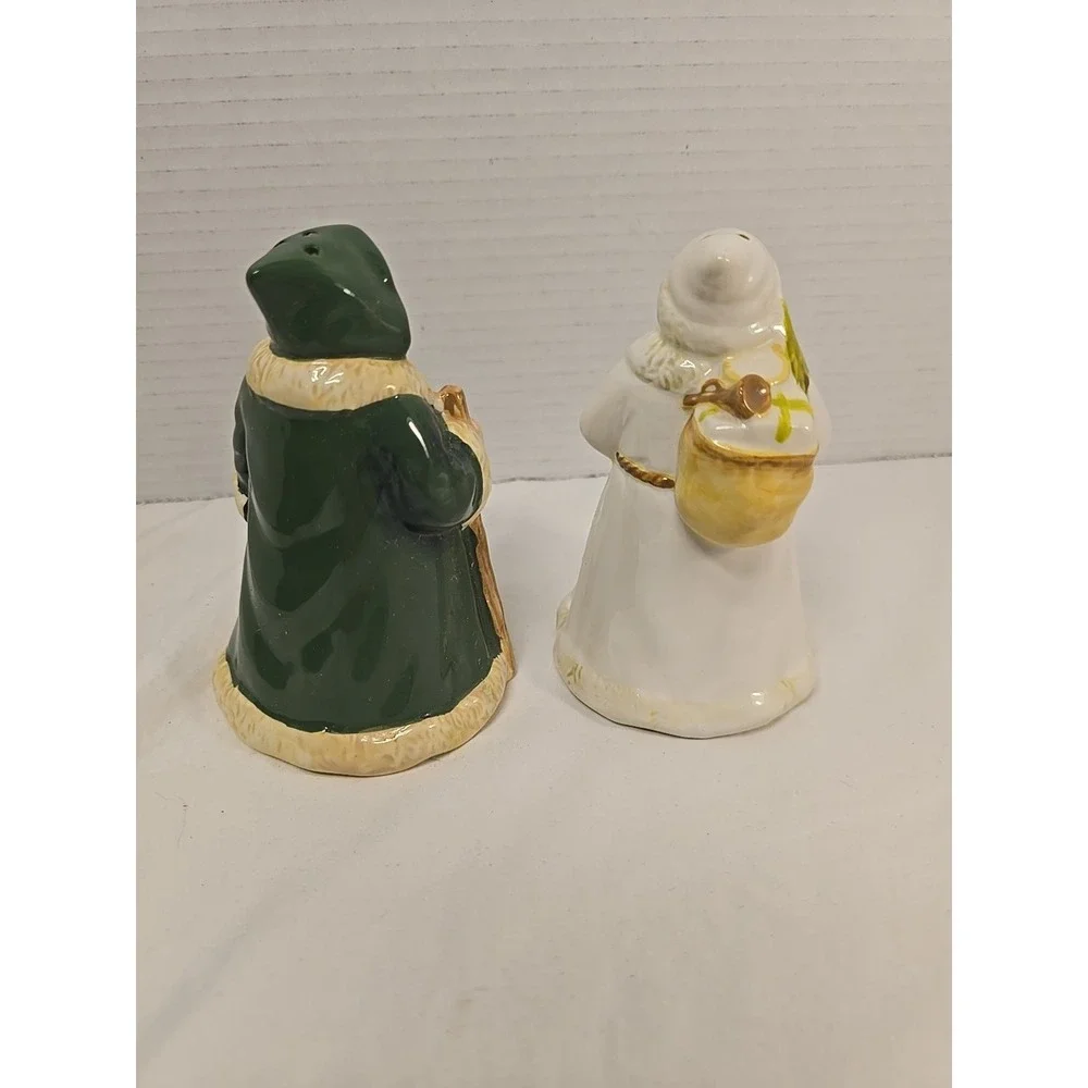 Santa Claus Through‎ The Years Salt & Pepper Shakers 5 Inches